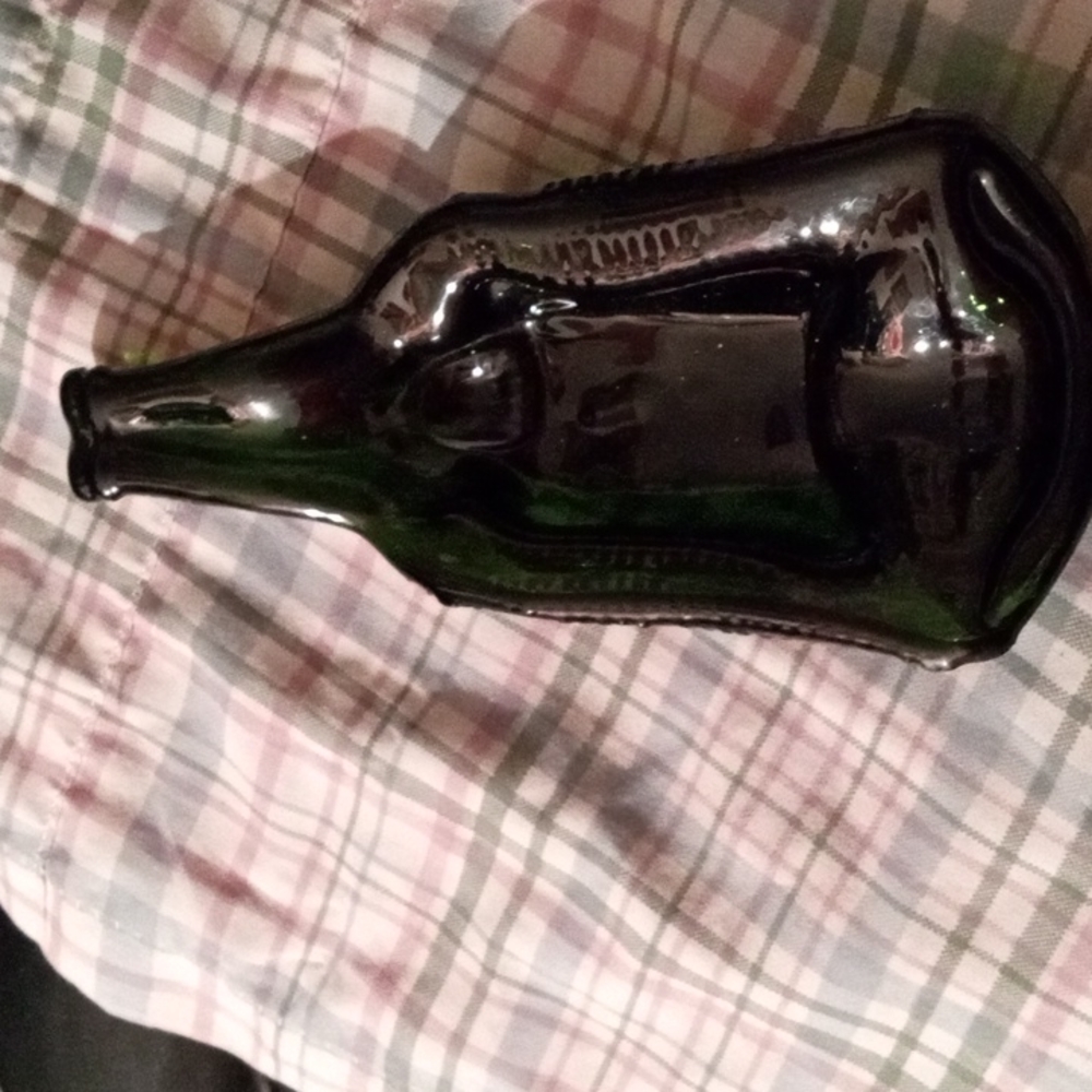 Antique green bottle dish candy, nuts or more.